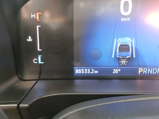 Dashboard odometer photographed before the road test