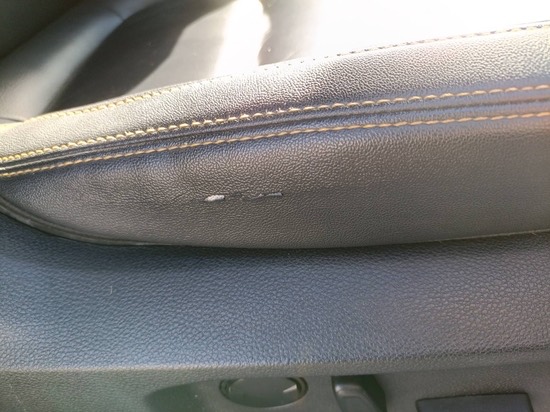 Minor wear found on the driver seat bolster
