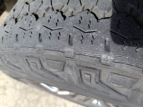 Rear tyre showing perished rubber, graded unroadworthy